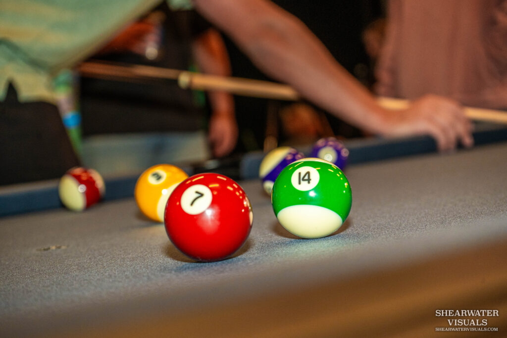 up close shot of pool balls on a pool table